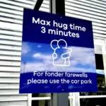 New Zealand airport imposes cuddle cap with 3-minute limit on goodbye hugs to avoid traffic jams