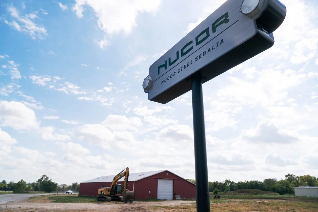 A sign for the Nucor Steel Mill, under construction, is seen in Sedalia