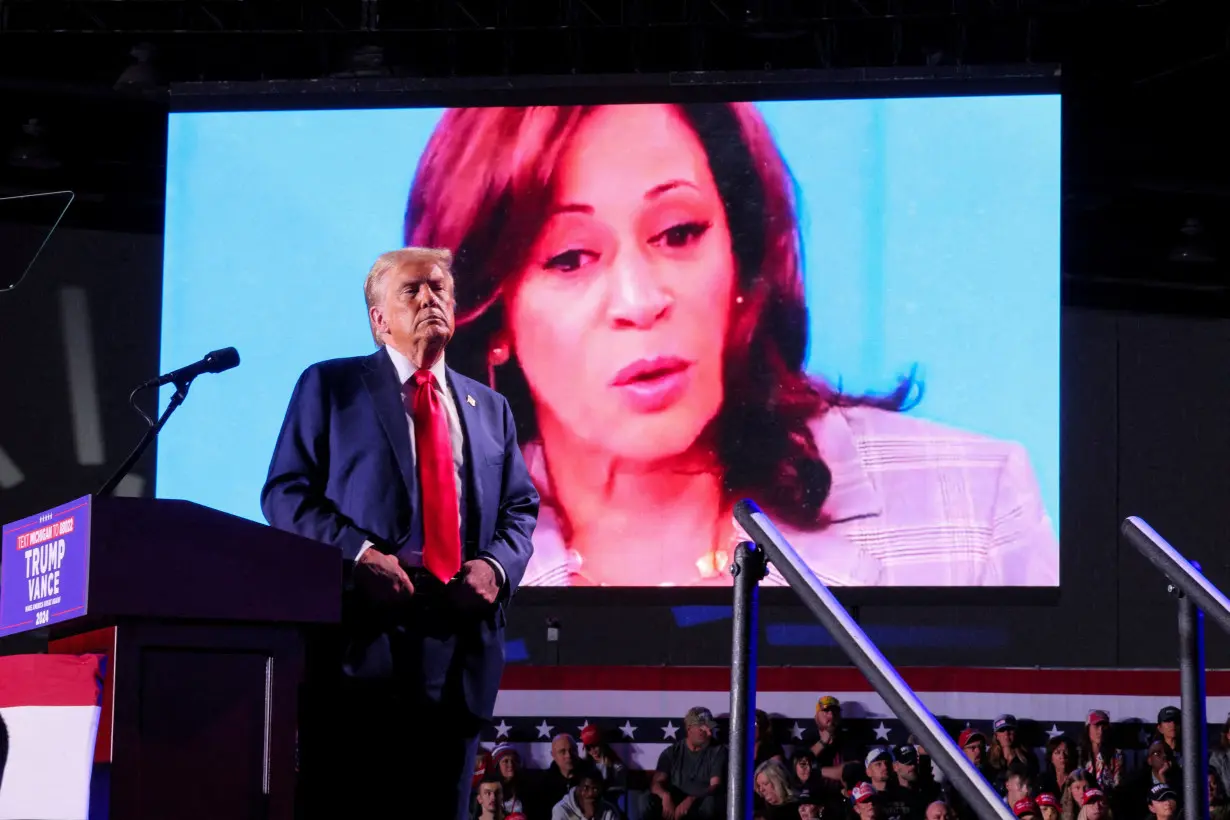 FILE PHOTO: Republican presidential nominee former U.S. President Donald Trump campaigns in Michigan