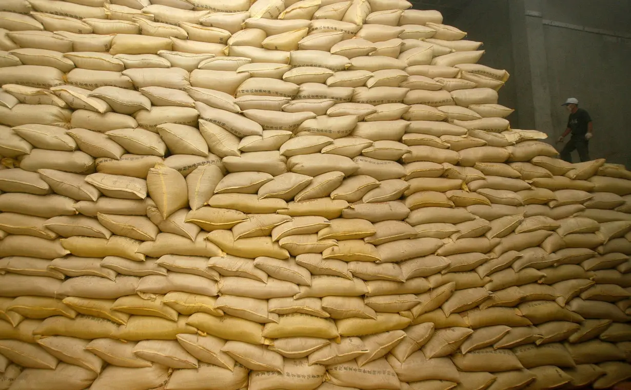 A man works in a rice factory in Jiaosi in Ilan County