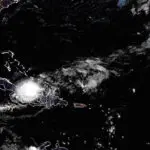 Tropical Storm Oscar swirls toward the Bahamas after hitting Cuba as a hurricane