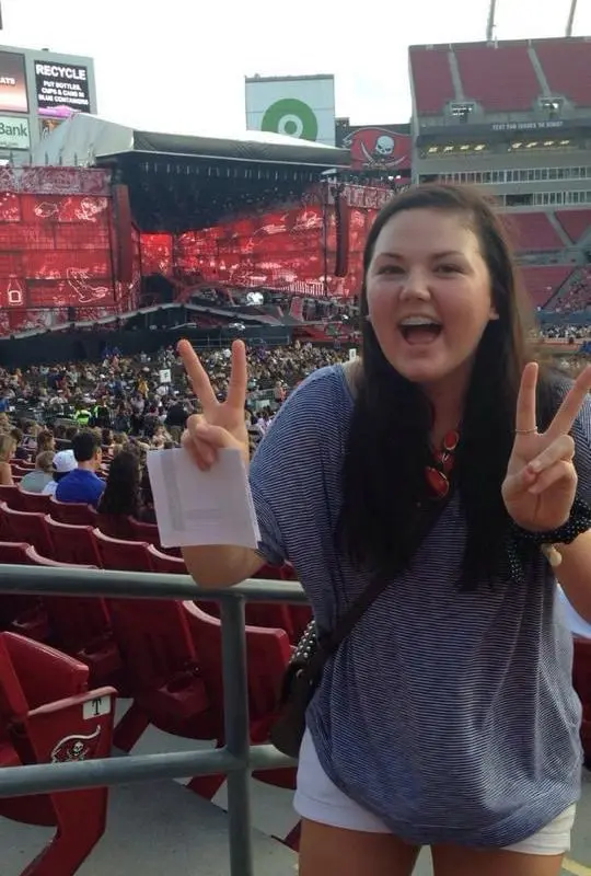 Maya Minich as a teenager seeing One Direction live in 2014.