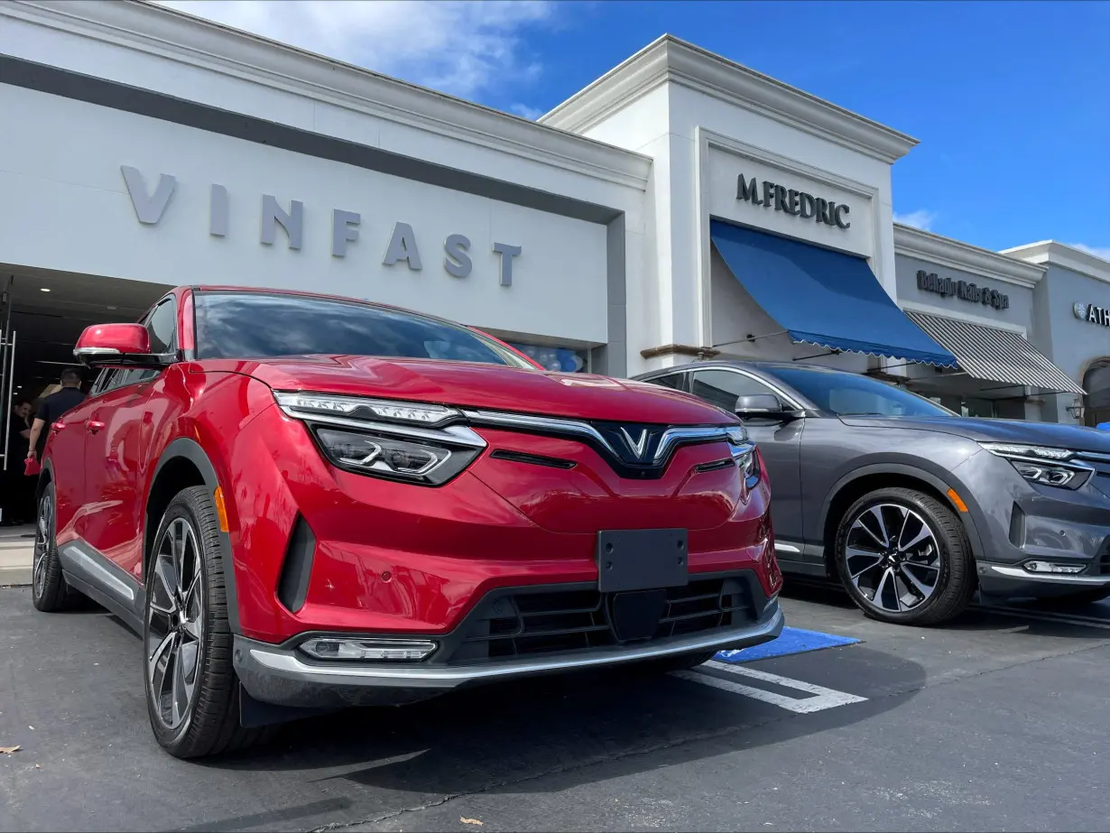 FILE PHOTO: VinFast electric vehicles are parked before delivery to their first customers at a store in Los Angeles