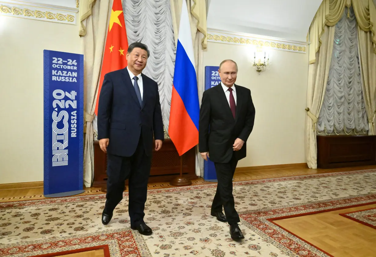 Russian President Vladimir Putin meets with Chinese President Xi Jinping in Kazan