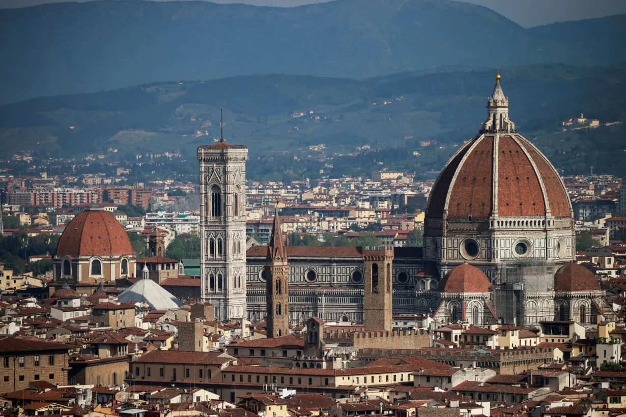 Brunelleschi's Dome and Giotto's Campanile of the Cathedral of Saint Mary of the Flower (Cattedrale di Santa Maria del Fiore) are pictured from a panoramic point of Florence