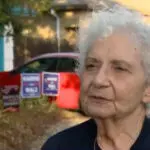 'He really has no right': Woman raises concerns after delivery man left opposing political signs on her lawn