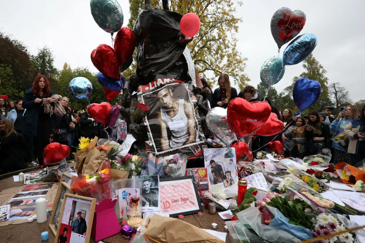 Fans gather to pay tribute to former One Direction singer Liam Payne in London