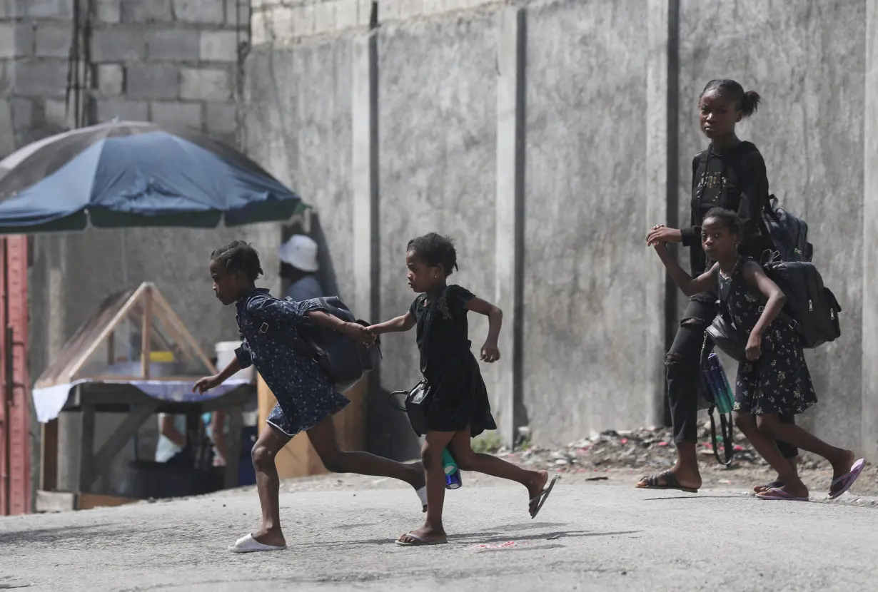 FILE PHOTO: Haitians flee homes from gang violence, in Port-au-Prince