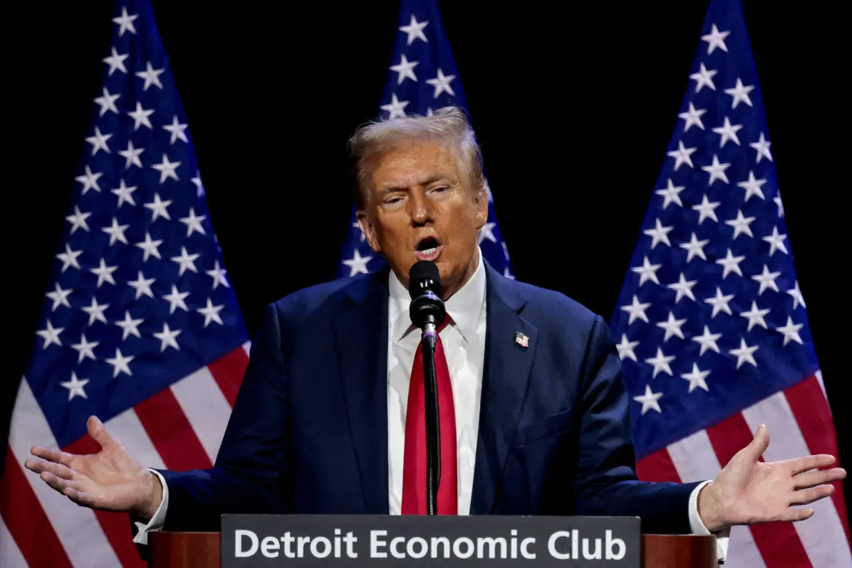 FILE PHOTO: Republican presidential nominee and former U.S. President Donald Trump makes an appearance at the Detroit Economic Club