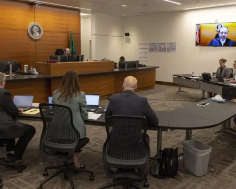 15-year-old boy is held pending charges in 5 deaths in Washington state