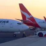 Australia's Qantas hits record high as Jefferies lifts price target