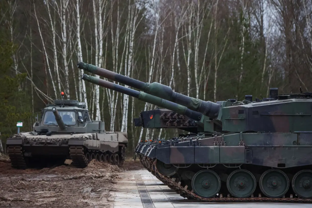 Polish President Andrzej Duda visits Ukrainian soldiers training on Leopard 2 A4 tanks in Swietoszow