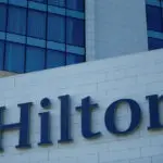 Hilton cuts 2024 room revenue growth forecast as US consumers trim travel spending