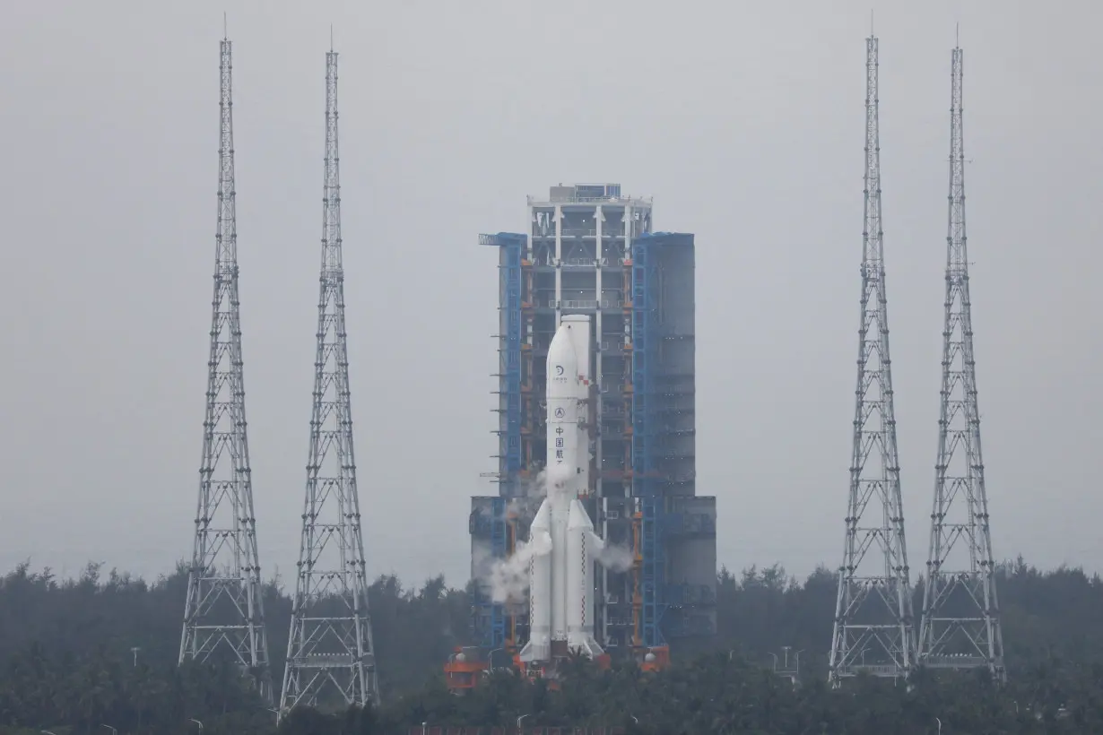 FILE PHOTO: The Chang'e 6 lunar probe and the Long March-5 Y8 carrier rocket combination sit atop the launch pad at the Wenchang Space Launch Site in Hainan province