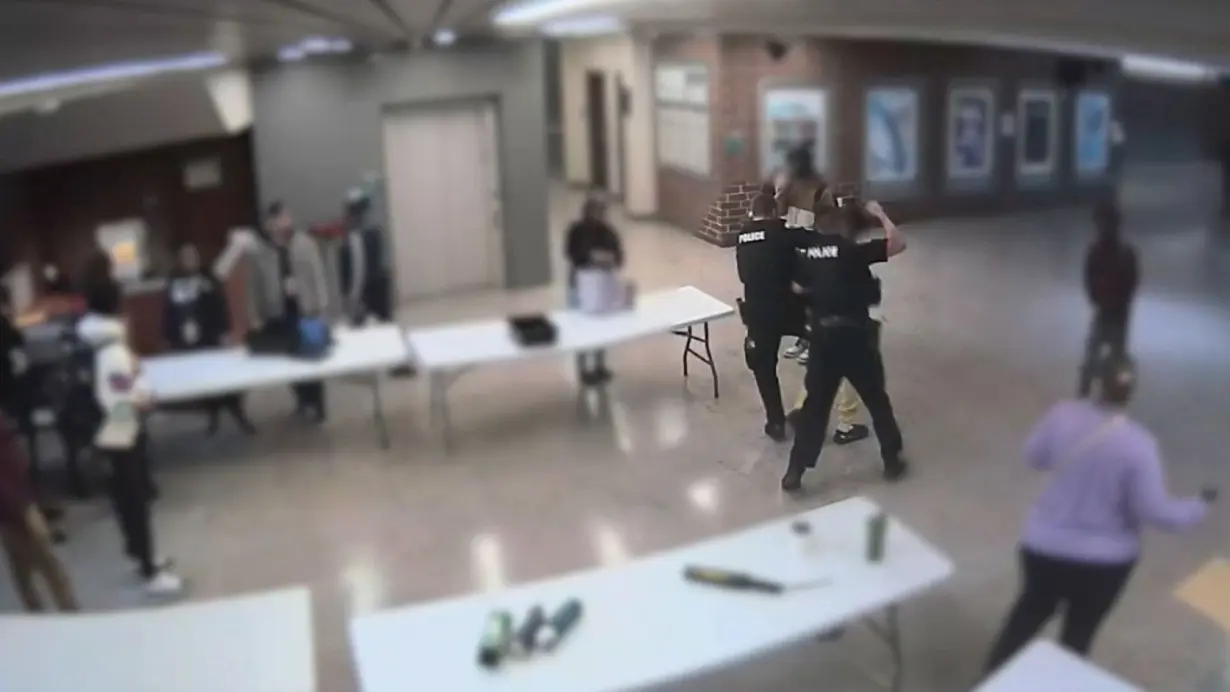 School resource officer seen punching student in head multiple times on surveillance video