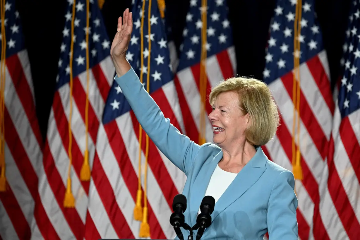 FILE PHOTO: U.S. Senator Tammy Baldwin (D-WI) gestures during a campaign event at West Allis Central High School