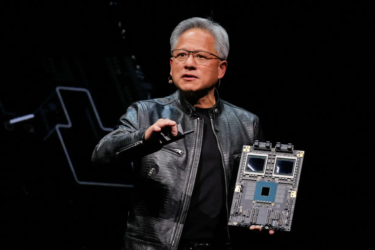 FILE PHOTO: Nvidia CEO Jensen Huang present NVIDIA Blackwell platform at an event ahead of the COMPUTEX forum, in Taipei