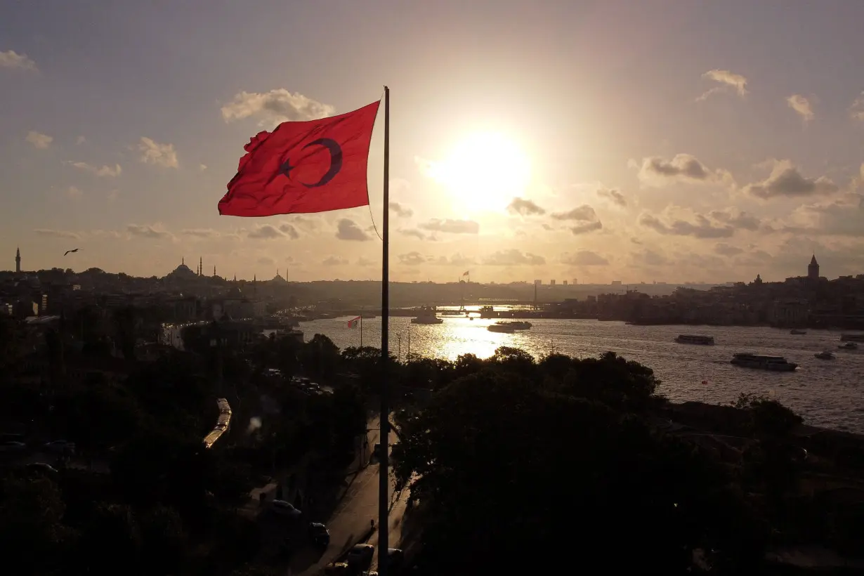 FILE PHOTO: A drone view shows a Turkish flag flying over Sarayburnu with the Golden Horn in the background, in Istanbul