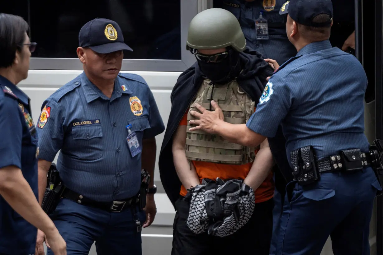 Filipino celebrity pastor Apollo Quiboloy arrives at the Pasig Regional Trial Court for an arraignment