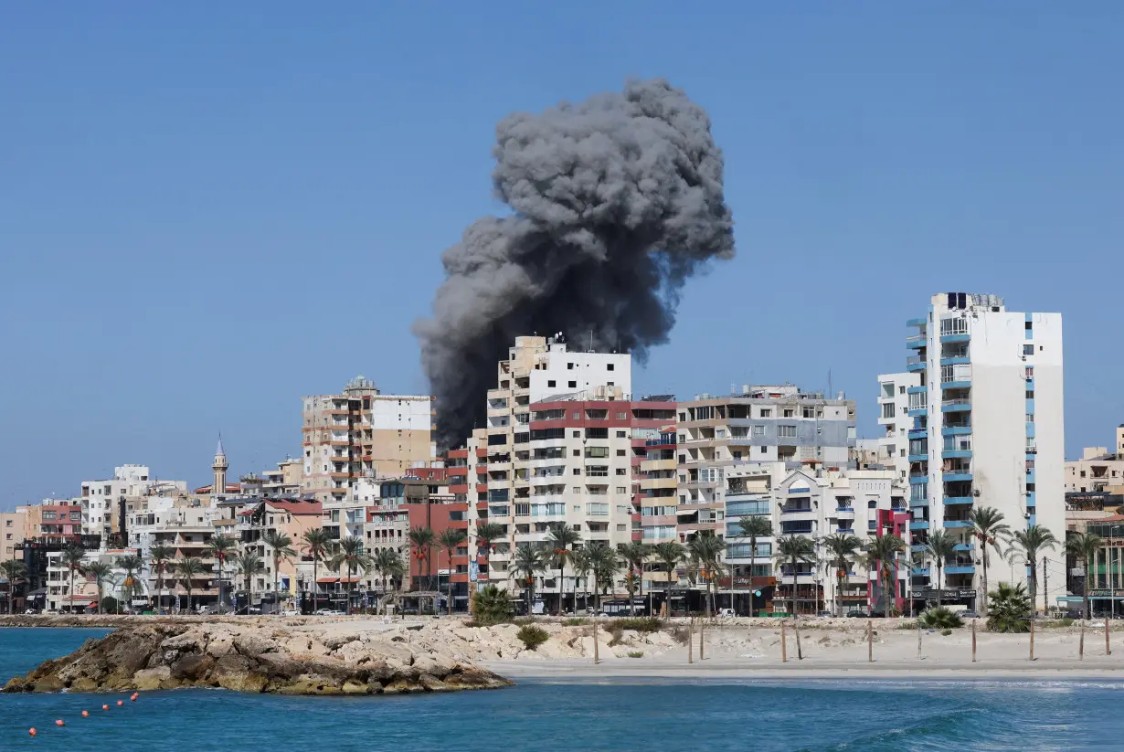 Smoke billows over the UNESCO-listed port city of Tyre after Israeli strikes