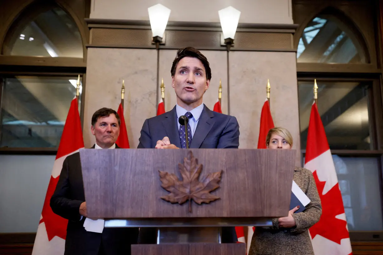 FILE PHOTO: Canada's Prime Minister Justin Trudeau takes part in a press conference on Parliament Hill in Ottawa