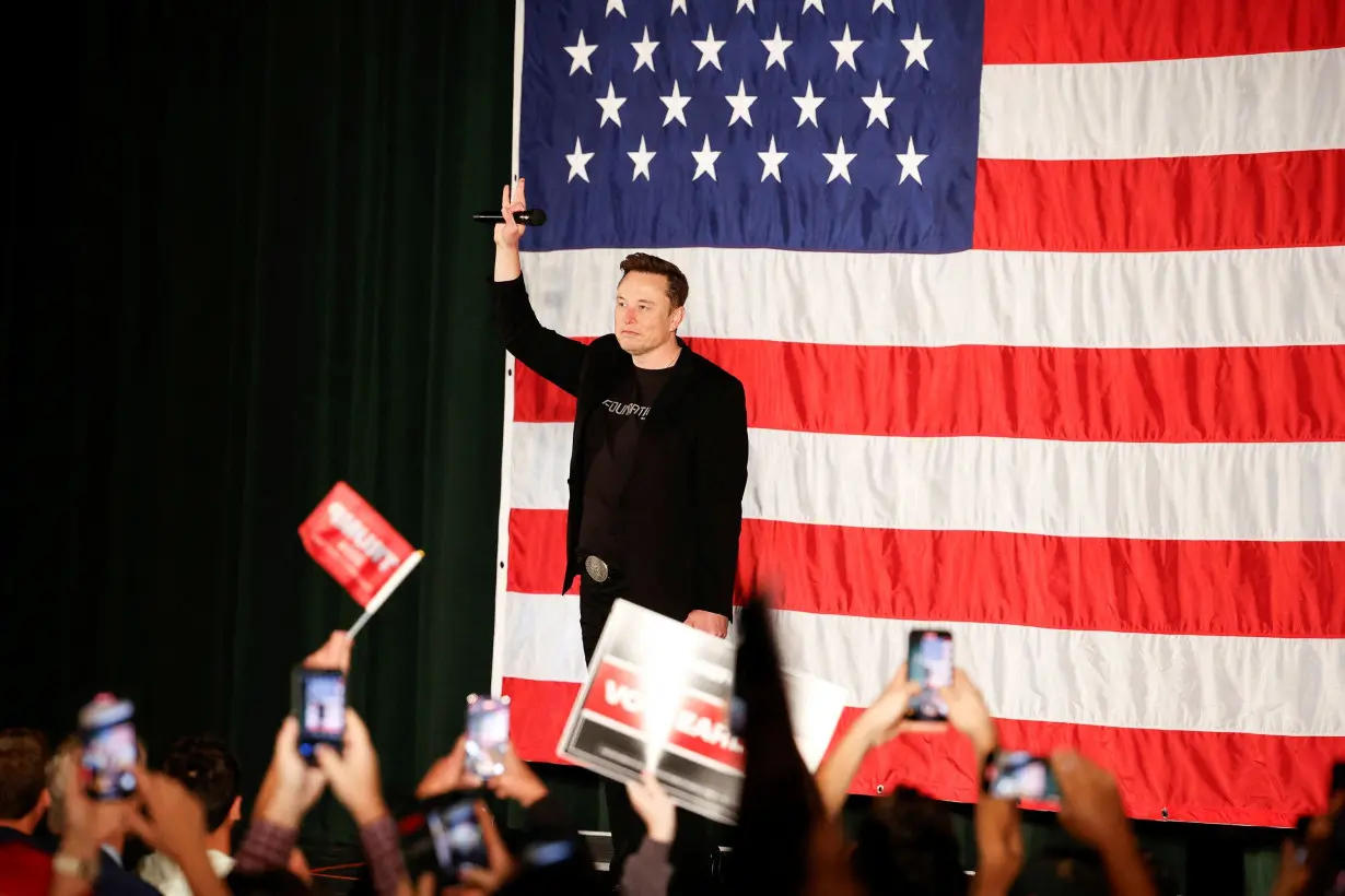 Justice Department warns Elon Musk that his $1 million giveaway to registered voters may be illegal