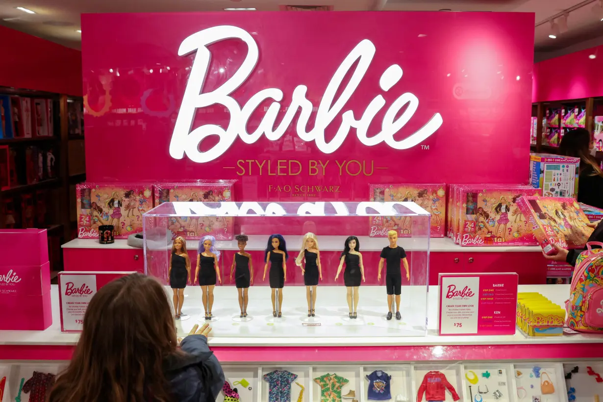 FILE PHOTO: Barbie dolls, a brand owned by Mattel, are seen at the FAO Schwarz toy store in Manhattan, New York City