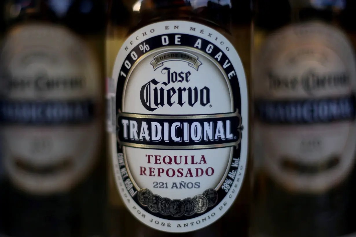 Bottles of Jose Cuervo Tequila rest on a shelf in Mexico City