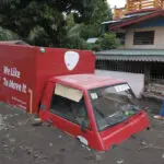 Tropical storm battering Philippines leaves at least 23 people dead in flooding and landslides