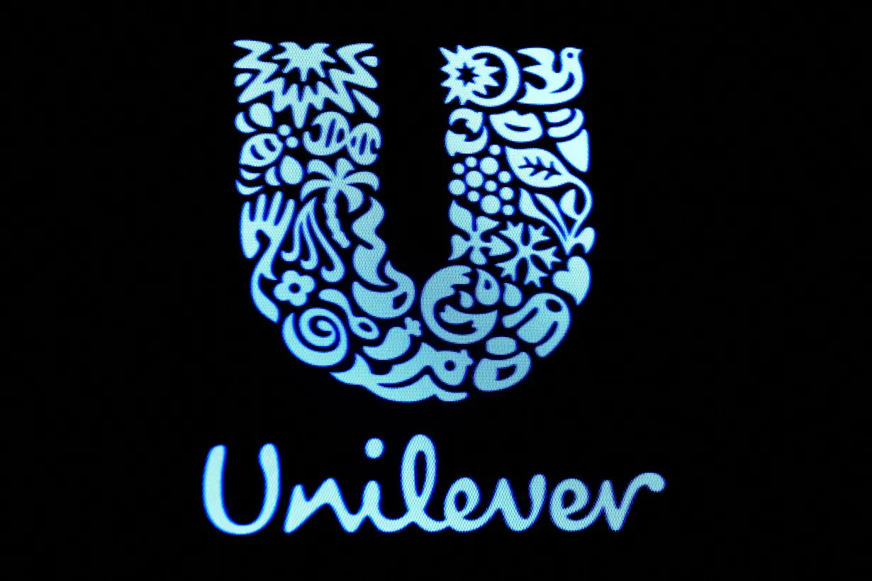 FILE PHOTO: FILE PHOTO: The company logo for Unilever is displayed on a screen on the floor of the NYSE