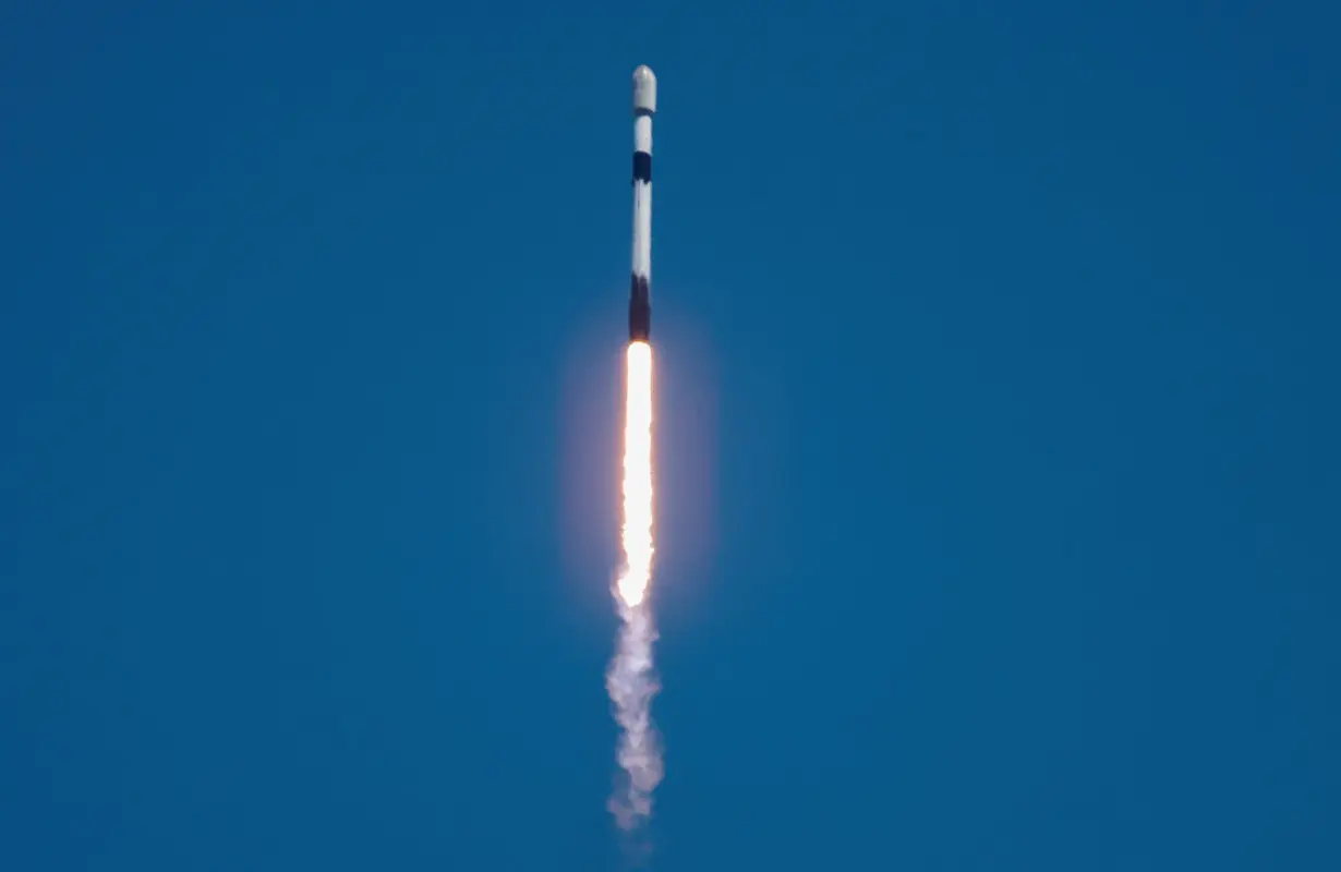 FILE PHOTO: A SpaceX Falcon 9 rocket is launched, carrying 23 Starlink satellites into low Earth orbit from Cape Canaveral