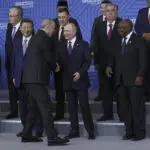 Putin presides over BRICS summit seeking to expand Russia's clout