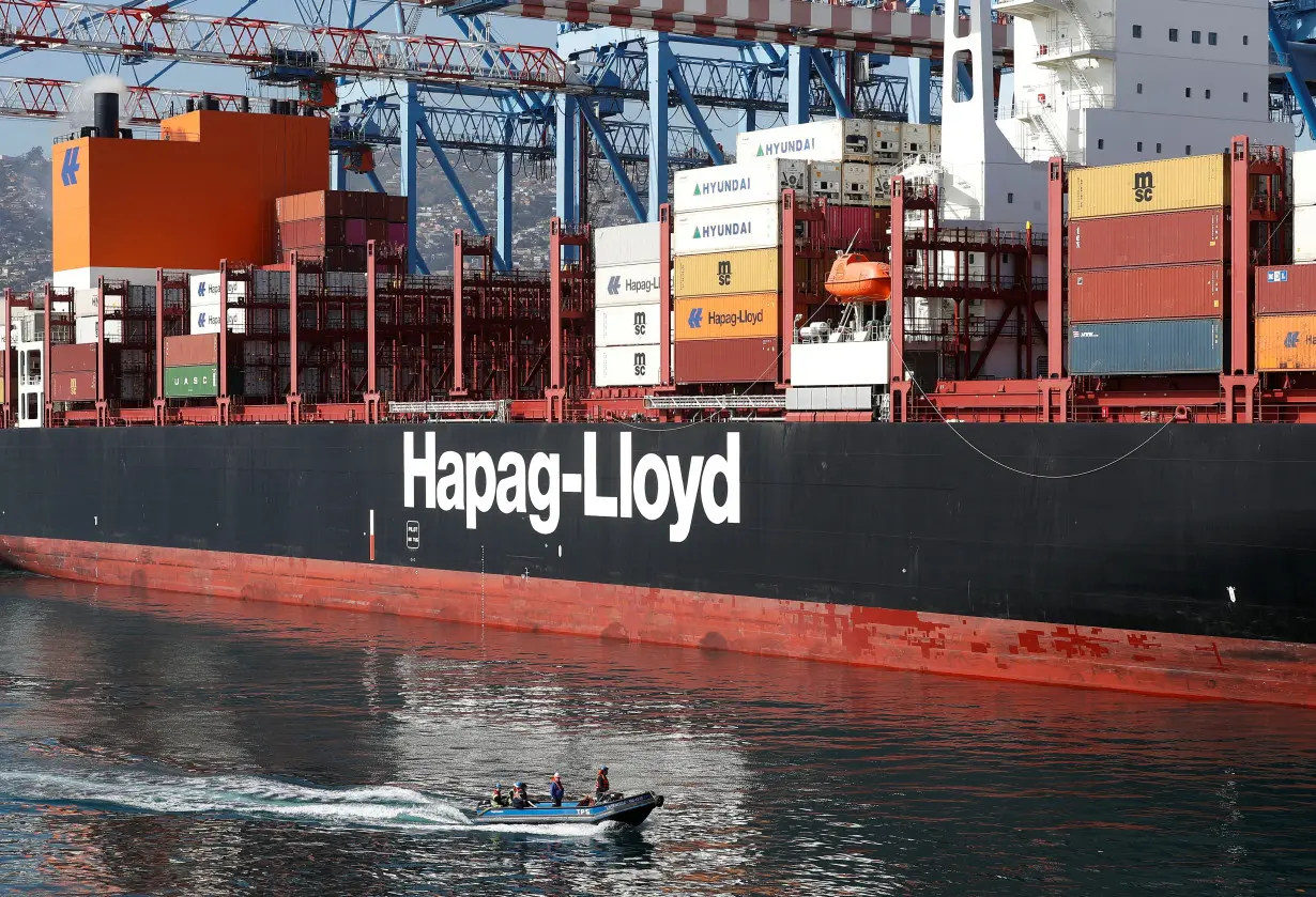 Hapag-Lloyd sign on a container ship is pictured at the Valparaiso port