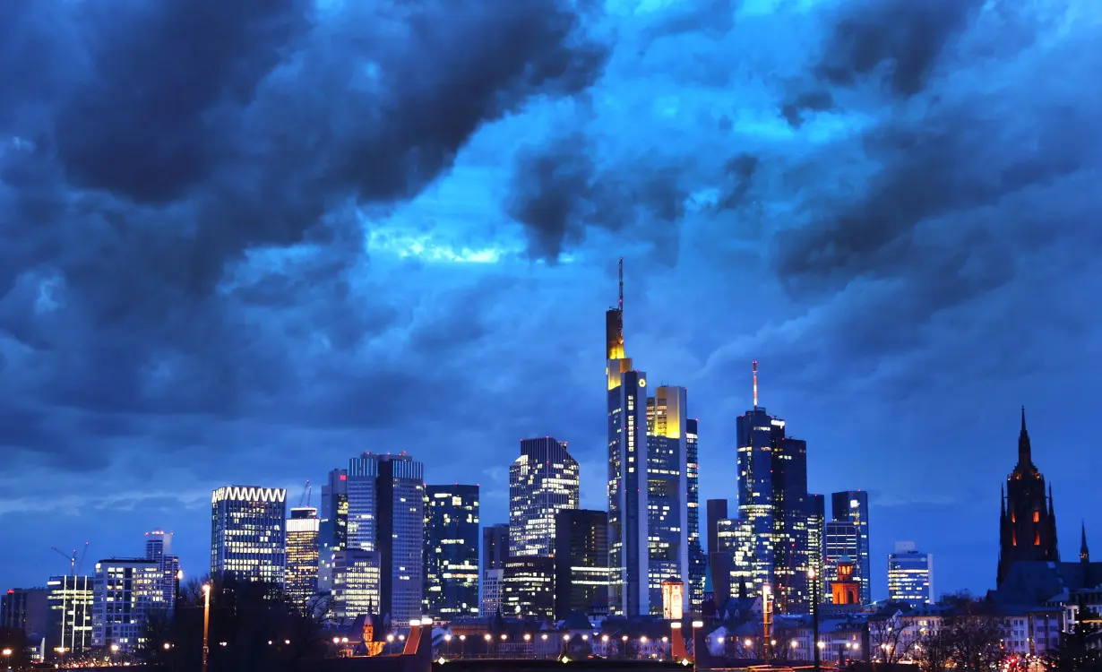 Dark clouds hang over the financial district in Frankfurt, Germany