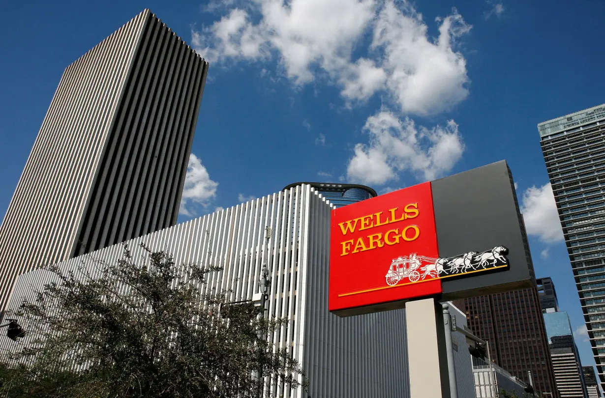 FILE PHOTO: A Wells Fargo sign is pictured outside a motor banking branch in downtown Houston