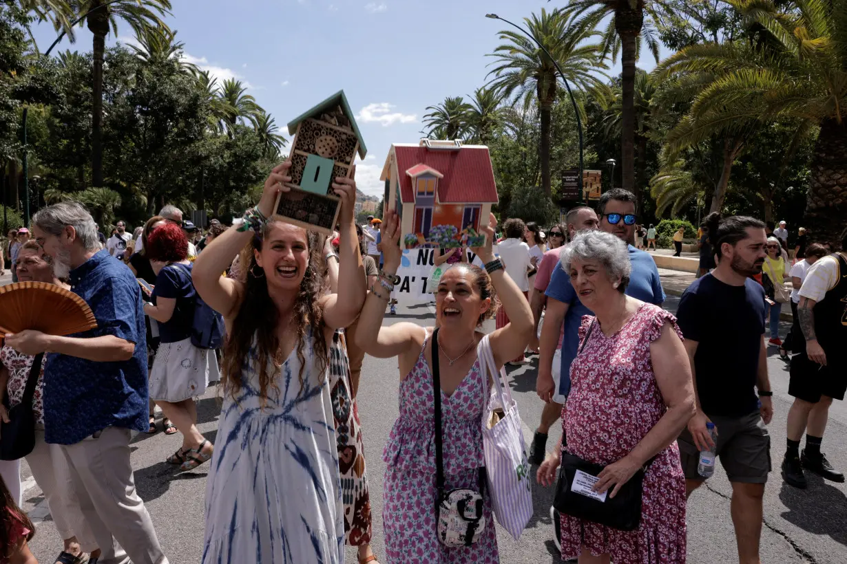 FILE PHOTO: People demonstrate against mass tourism in Malaga