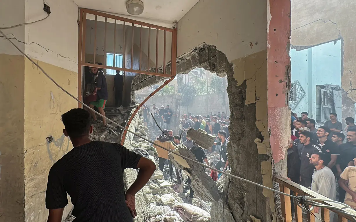 Aftermath of Israeli strike on a school sheltering displaced people, in Nuseirat in the central Gaza Strip