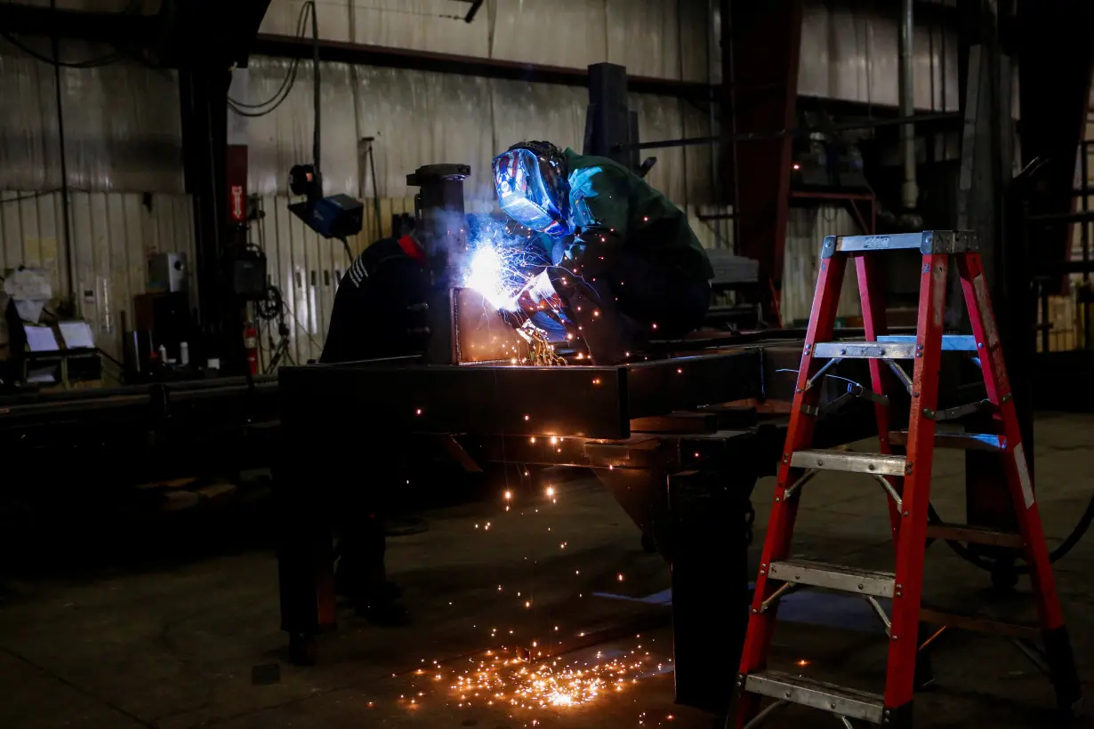 Matt Arnold, CEO of Look Trailers, tours the company's utility trailer manufacturing facility in Middlebury