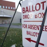 Major Michigan city decides against verifying mail ballots early, potentially slowing results