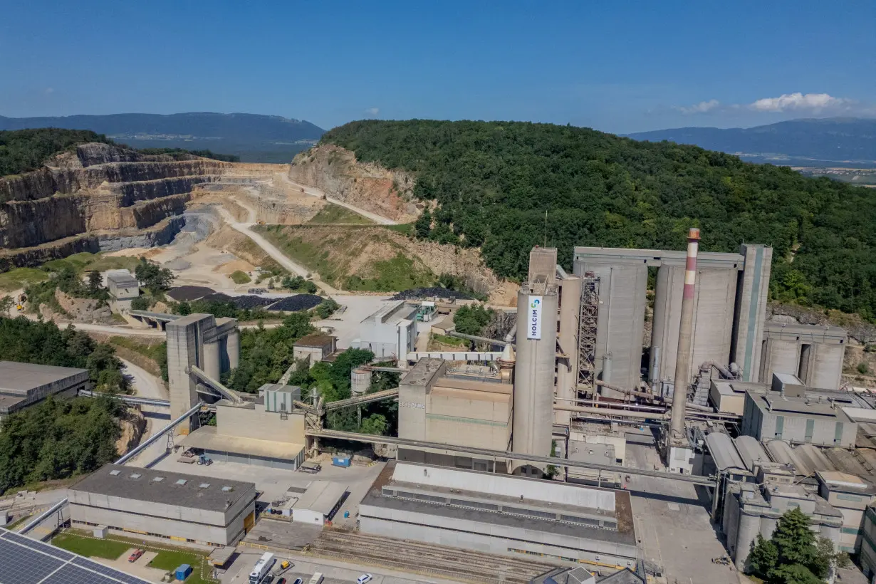 A drone view shows the Mormont Hill and the plant of cement maker Holcim in Eclepens