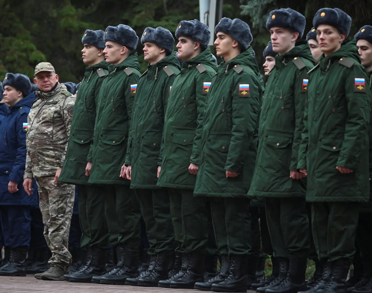 FILE PHOTO: Russian conscripts called up for military service depart for their garrisons, in Bataysk