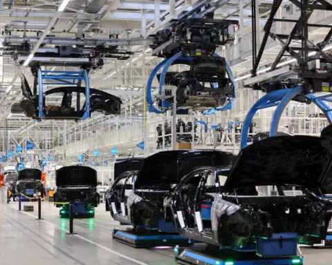 German business sentiment rises, giving rare boost to ailing economy