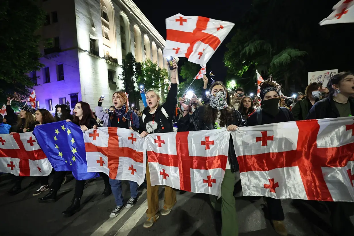 Protesters rally against the 