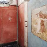 Tiny house with elaborate – and erotic – frescoes unearthed at Pompeii