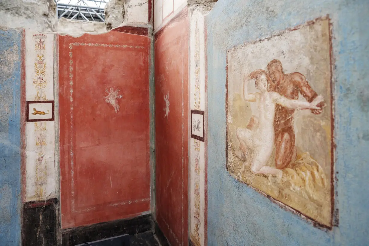 Tiny house with elaborate – and erotic – frescoes unearthed at Pompeii