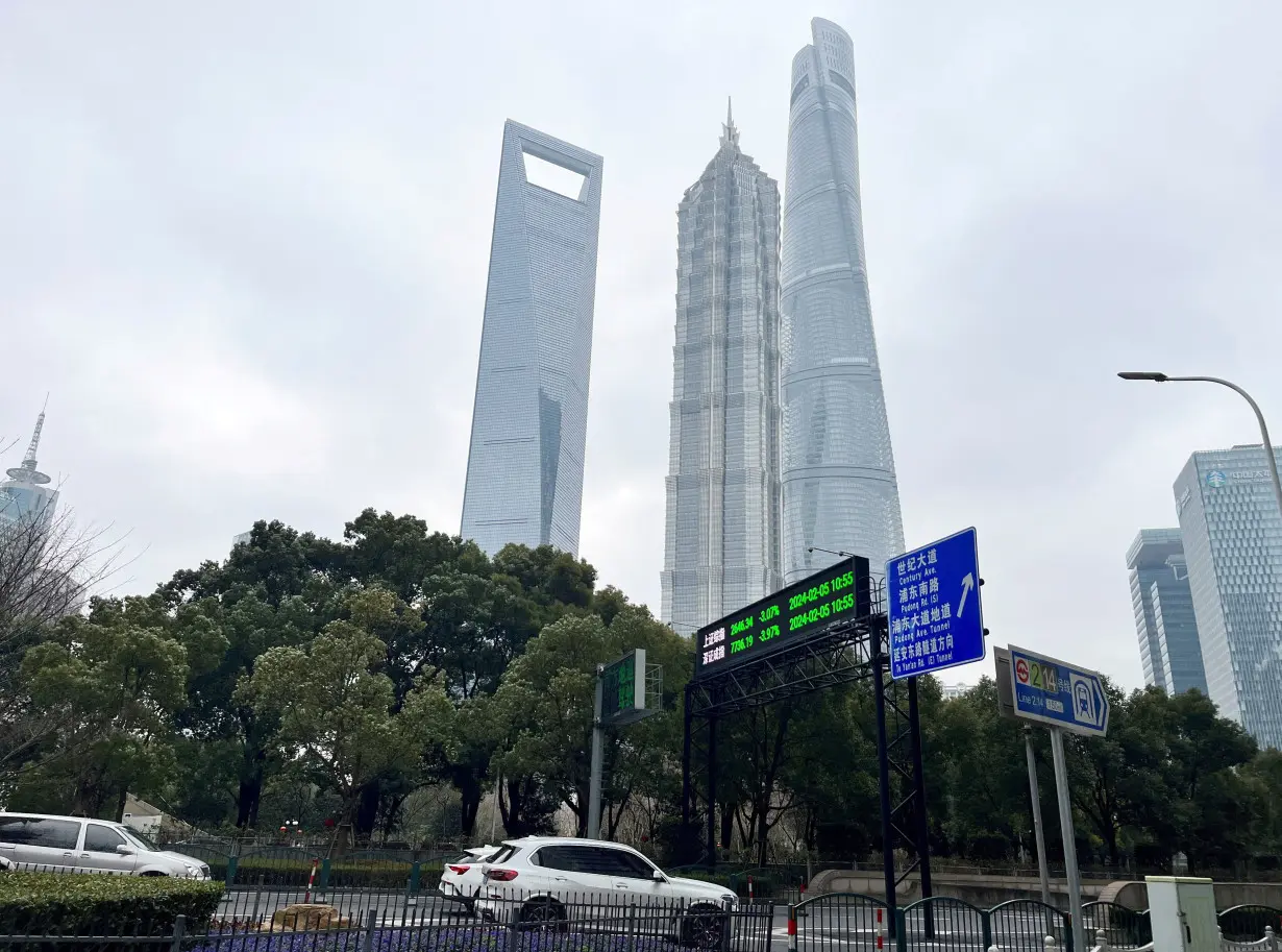 FILE PHOTO: Display of stock information in Shanghai