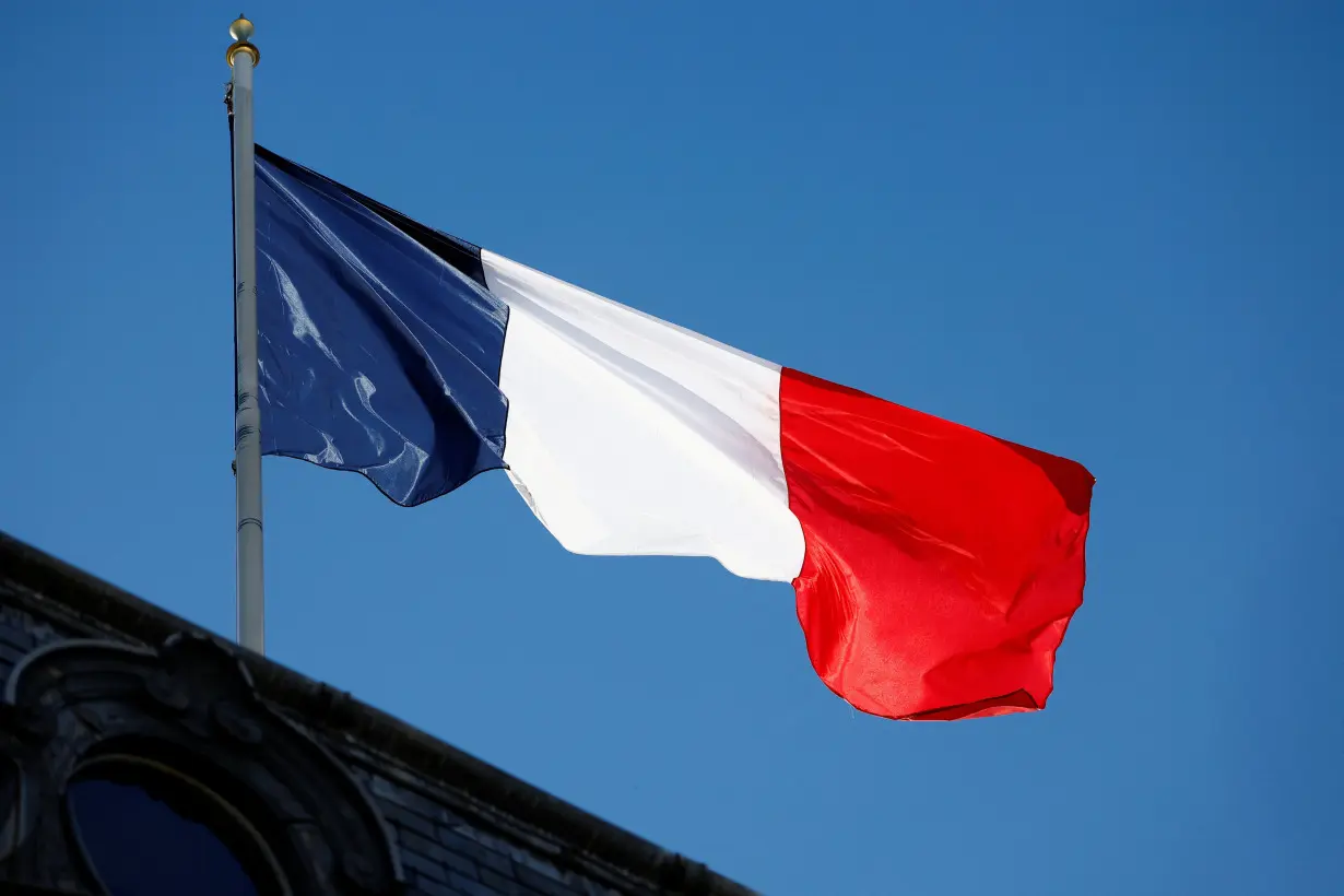 A French flag at the Elysee Palace in Paris