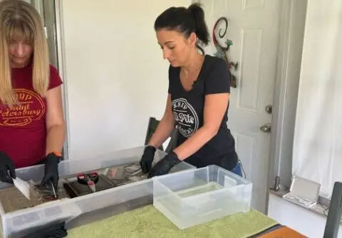 Florida women help families save photo albums damaged by recent hurricanes