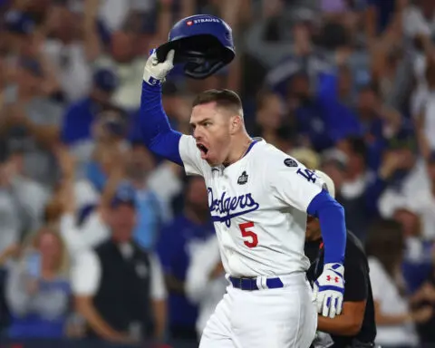 Los Angeles Dodgers’ Freddie Freeman launches himself into history with dramatic grand slam to win Game 1 of the World Series