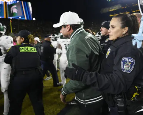 Michigan and Michigan State throw punches, push and shove after Wolverines beat rival Spartans